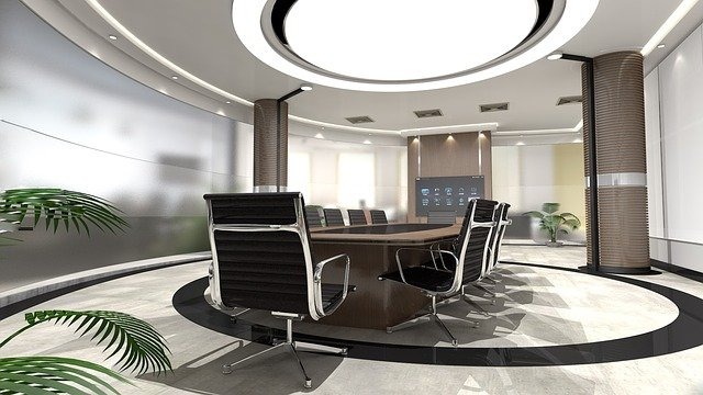 Modern conference room with circular lighting and contemporary furniture